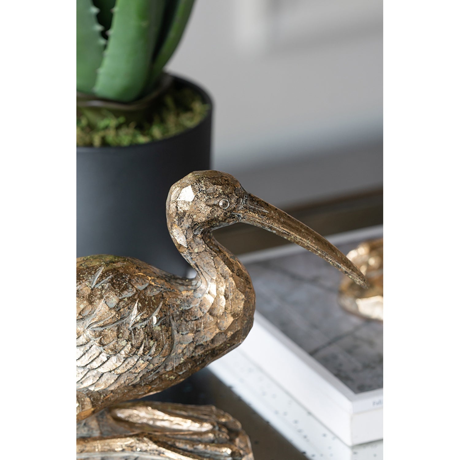 Kneeling Crane Figurine