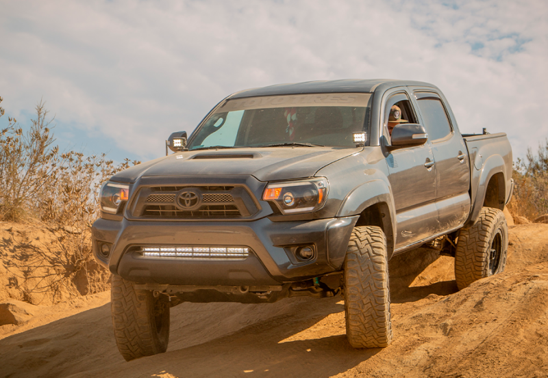 Cali Raised LED Cali Raised 05-15 Toyota Tacoma Low Prof Ditch Light Brackets Kit W/Can Pods Amber Backlight - Tall CR2897