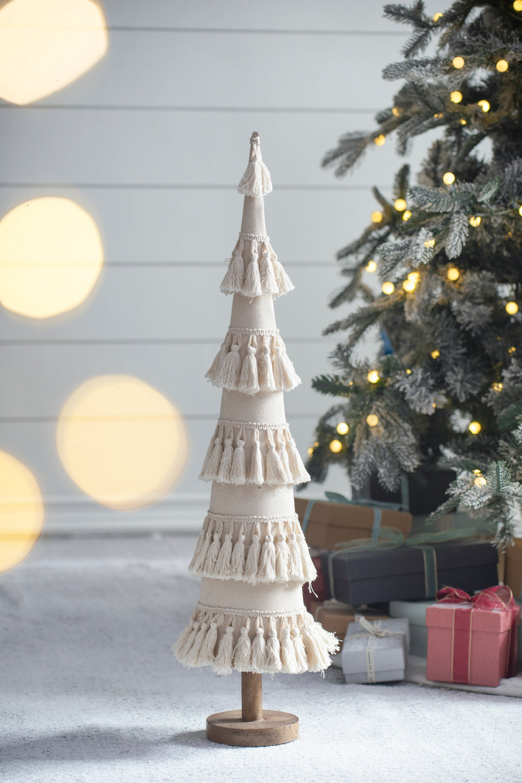 Fringes Embellished Cone With Wooden Base