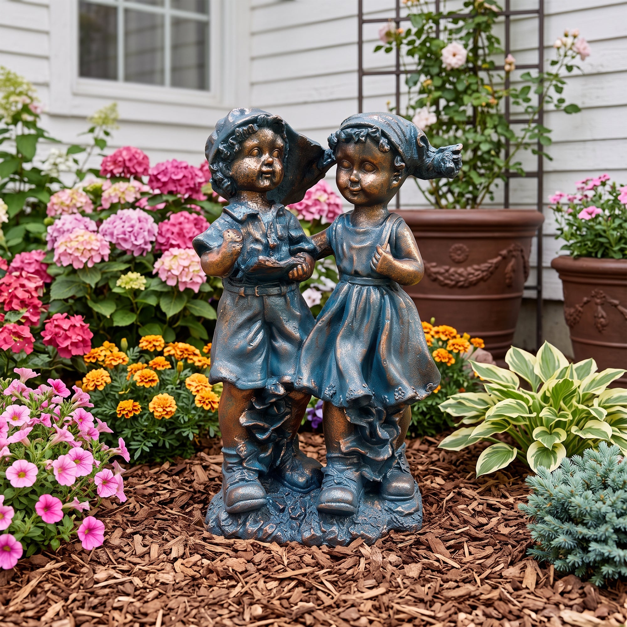 Magnesium Oxide Statues of Boy and Girl