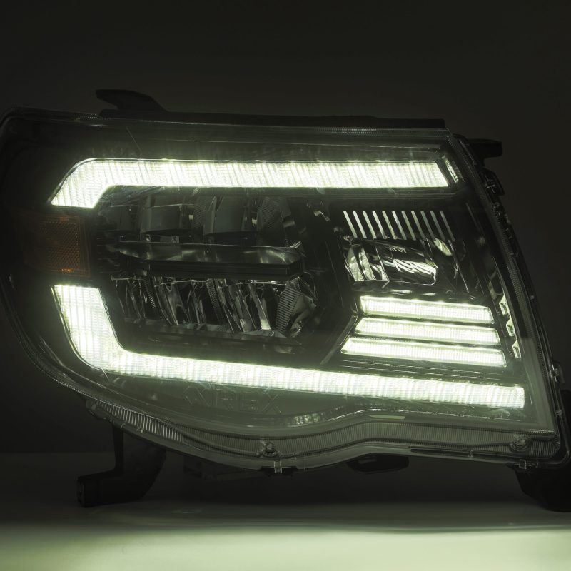 AlphaRex 05-11 Toyota Tacoma LUXX Crystal Headlights Plank Style Alpha Black w/Activation Light/DRL 880733 *Discontinued