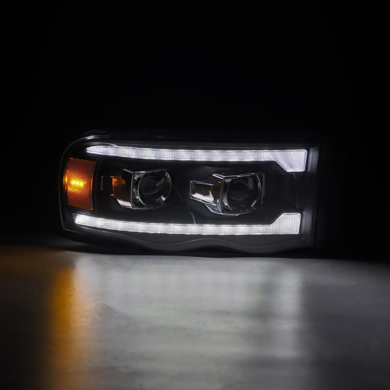 AlphaRex 02-05 Dodge Ram 1500 PRO-Series Projector Headlights Plank Style Black w/Seq Signal 880570 *Discontinued