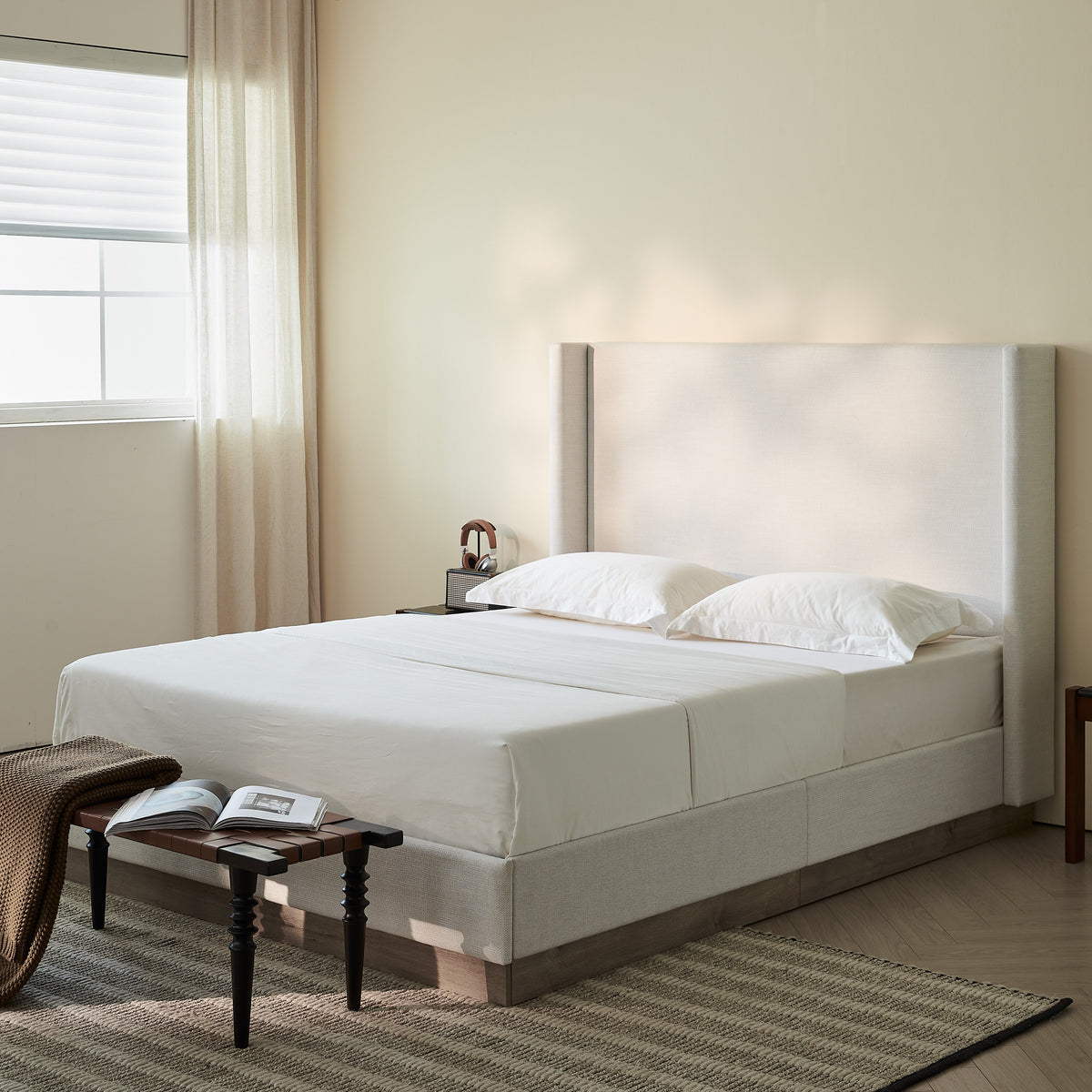 Hosford Upholstered Wingback Bed