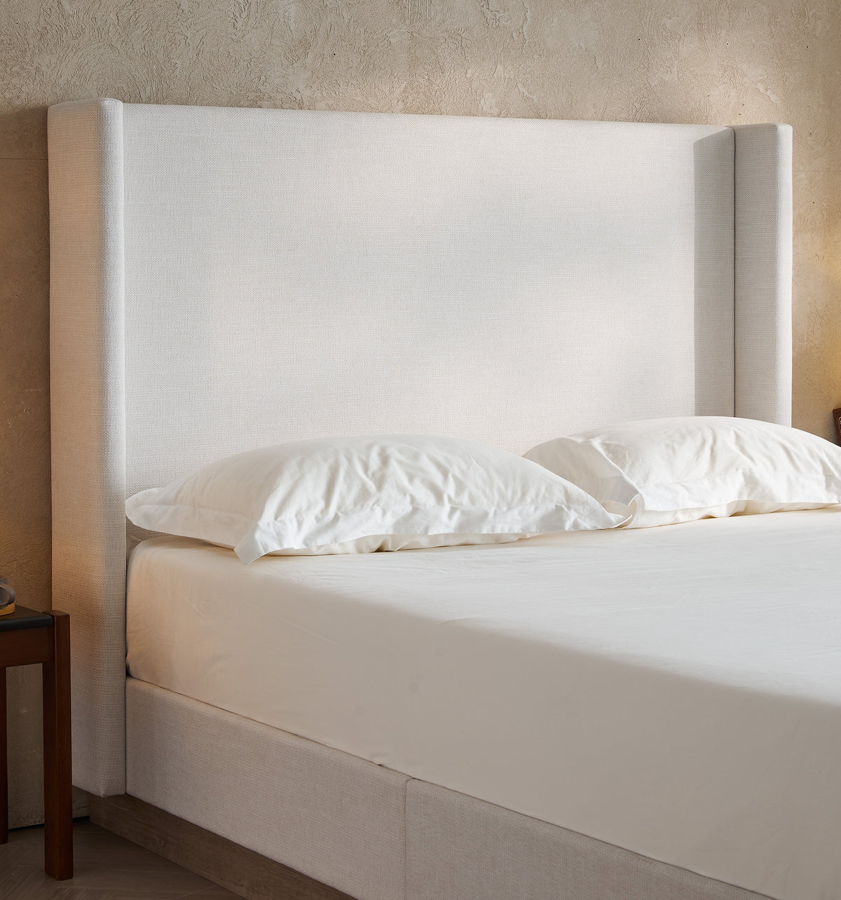 Hosford Upholstered Wingback Bed
