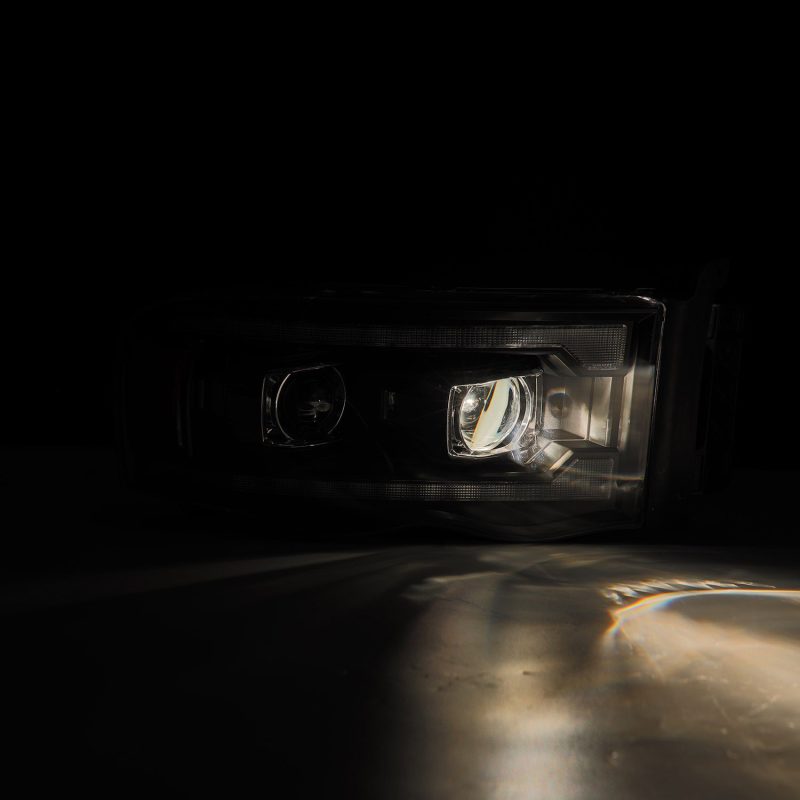AlphaRex 02-05 Dodge Ram 1500 LUXX LED Proj Headlights Plank Style Black w/Activ Light/Seq Signal 880567 *Discontinued