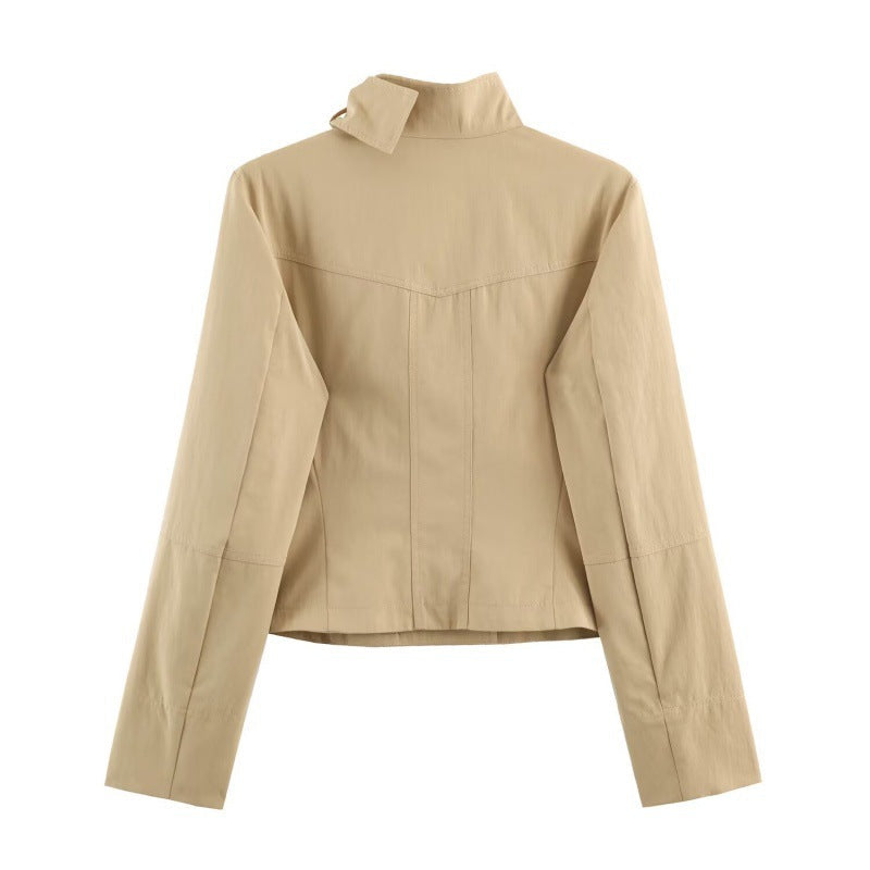 Elegant Double-breasted Coat Featuring A Stand-up Collar, Pockets, And A Fitted Waist