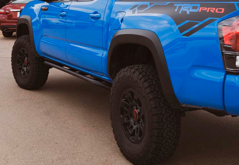 Cali Raised LED Cali Raised 05-23 Toyota Tacoma Trail Edition Rock Sliders Access Cab / Kick Out / Powder Coat CR2581