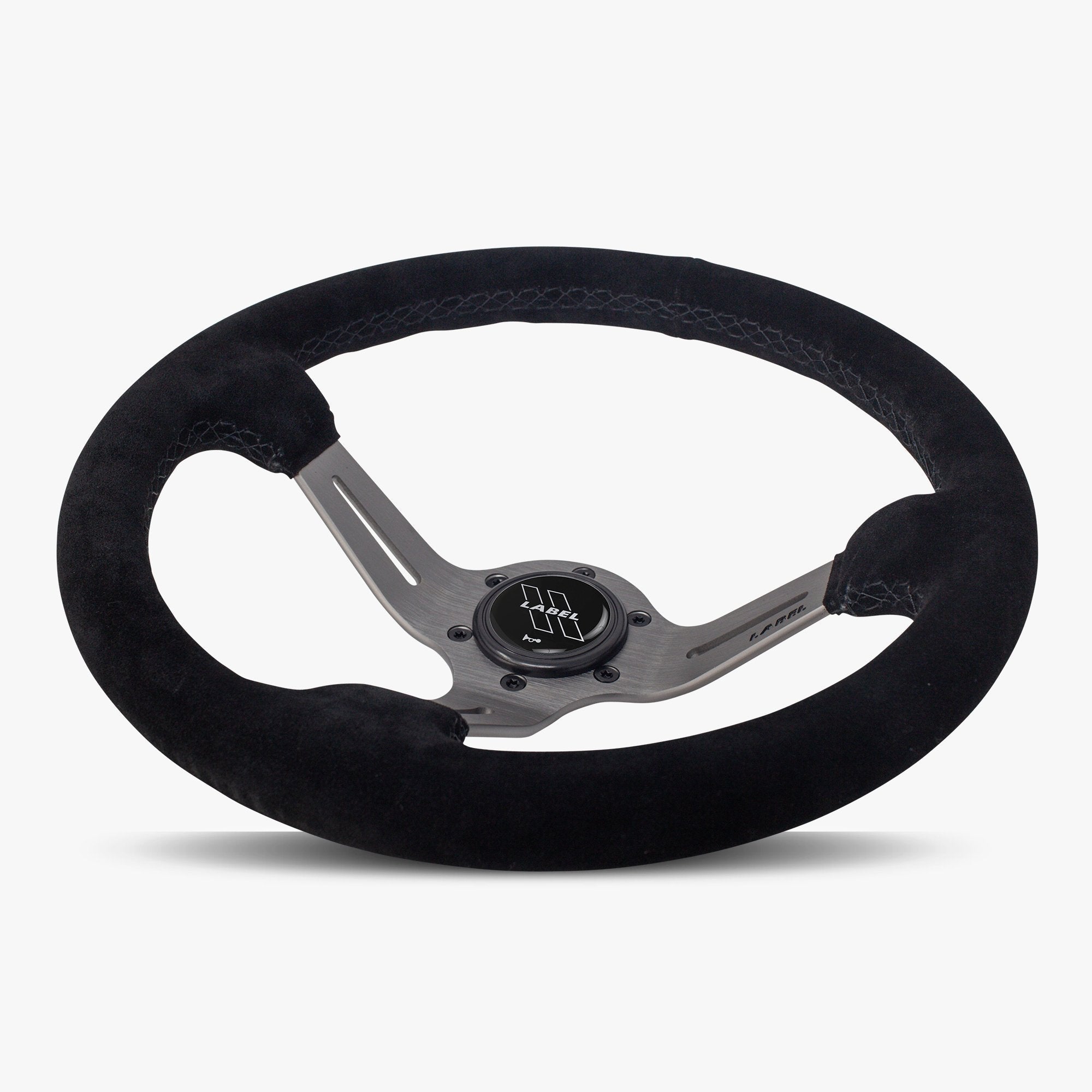The Le Mans | Black Alcantara Suede | Graphite Spoke | Black Stitch